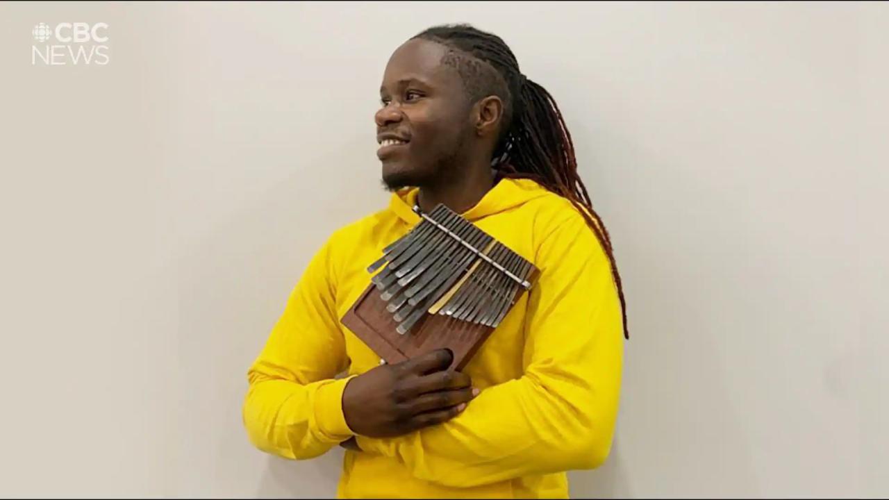 What musicians pluck on an mbira